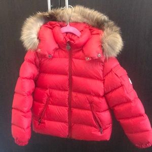 Moncler girls red puffer jacket.